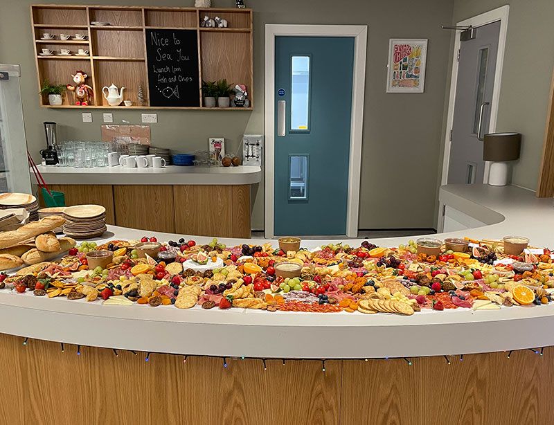 A long grazing table set up at an event
